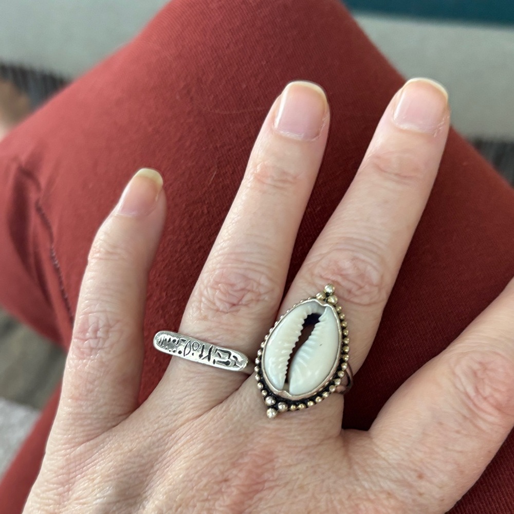 Sterling & cowrie shell